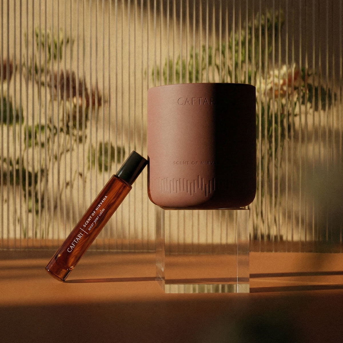 Caftari: Scent of Nirvana Rollerball + Candle Bundle